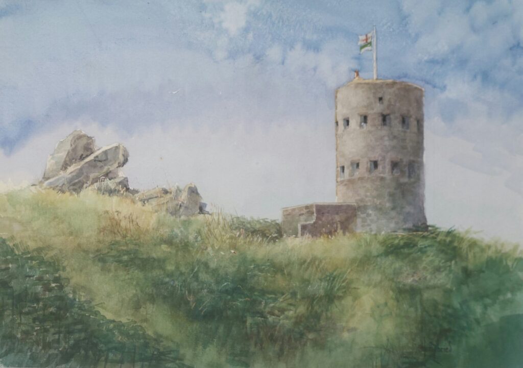 a lovely watercolour painting of Loophole Tower No 5 at L'Ancresse in Guernsey, showing the Guernsey flag flying proudly at the top of the tower.