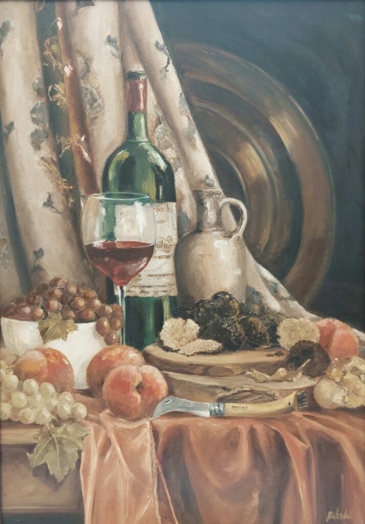 Still life oil painting by Florence Dibsdall showing a table with a red wine bottle, glass of wine, truffles, fruit, jug, knife, and a draped cloth.